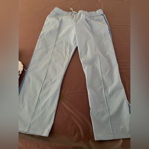 Guess Track pants with side stripe. Light blue with darker blue stripe. S.